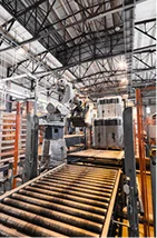Steel tubes moving along the production line